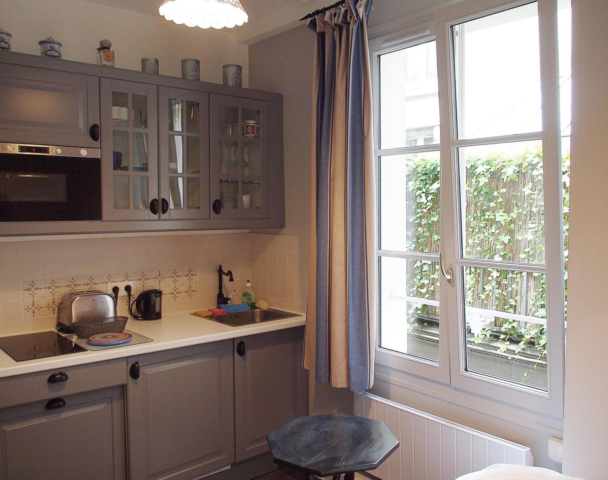 Petit Paris - Oasis In Marais Appartement Buitenkant foto